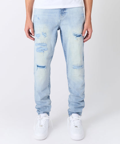 Ripped And Repaired Washed Denim Jeans - Light Blue