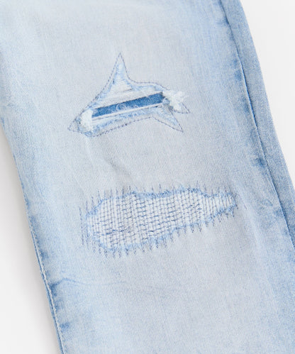 Rip And Repair Light Wash Denim Jeans